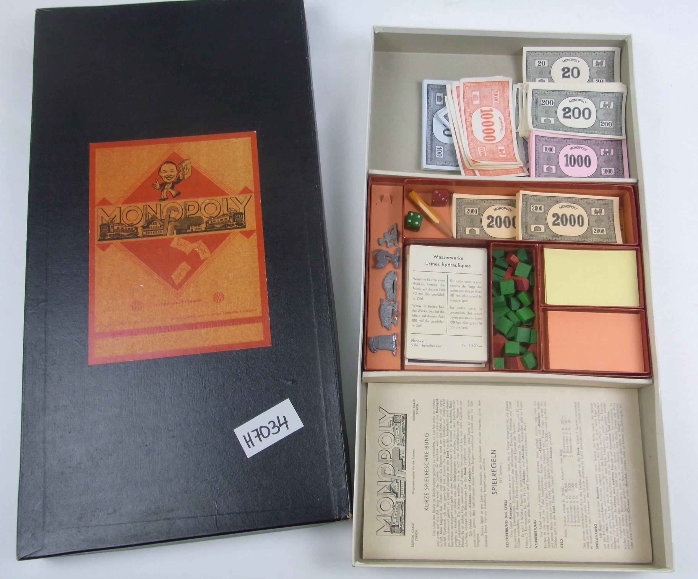 Foto oder Abbildung des Sammlungsobjekts „Monopoly, Edition CARLIT Zürich“