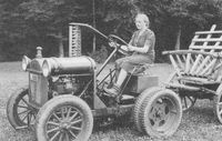 Olga Feurer (geb. 1920) auf einem Bührer-Traktor, 1938