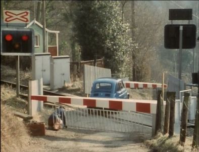 A car is trapped on the level crossing