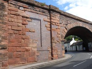 The pilaster next to the skew arch with a large repair to the ashlar to its left