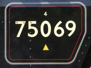 The yellow triangle on 75069's cab