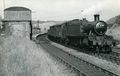 1961: Buildwas, View east of southbound GWR Large Prairie 6128 on Much Wenlock goods